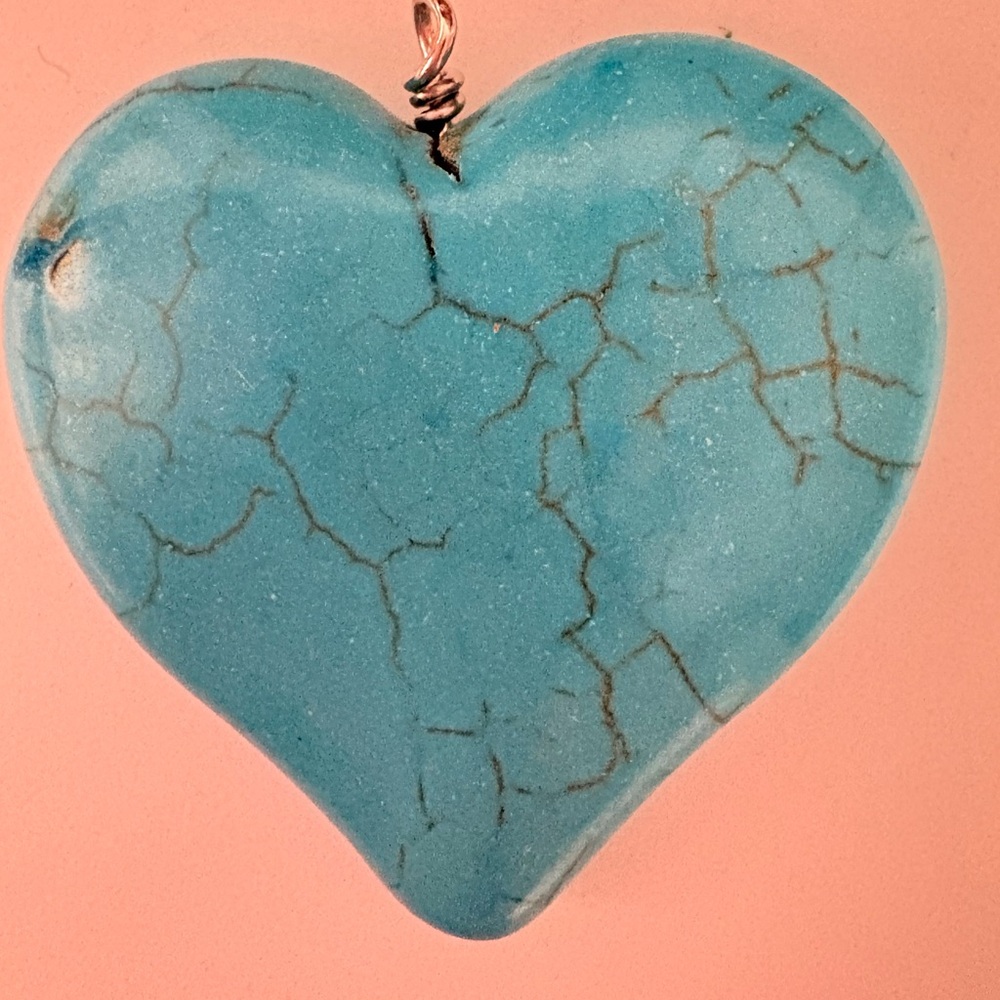 Boho Turquoise color Heart Pendant with silver tone wire wrapped nail
